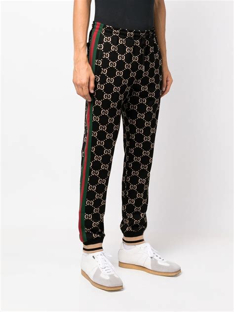 black gucci track pants|authentic gucci tracksuit.